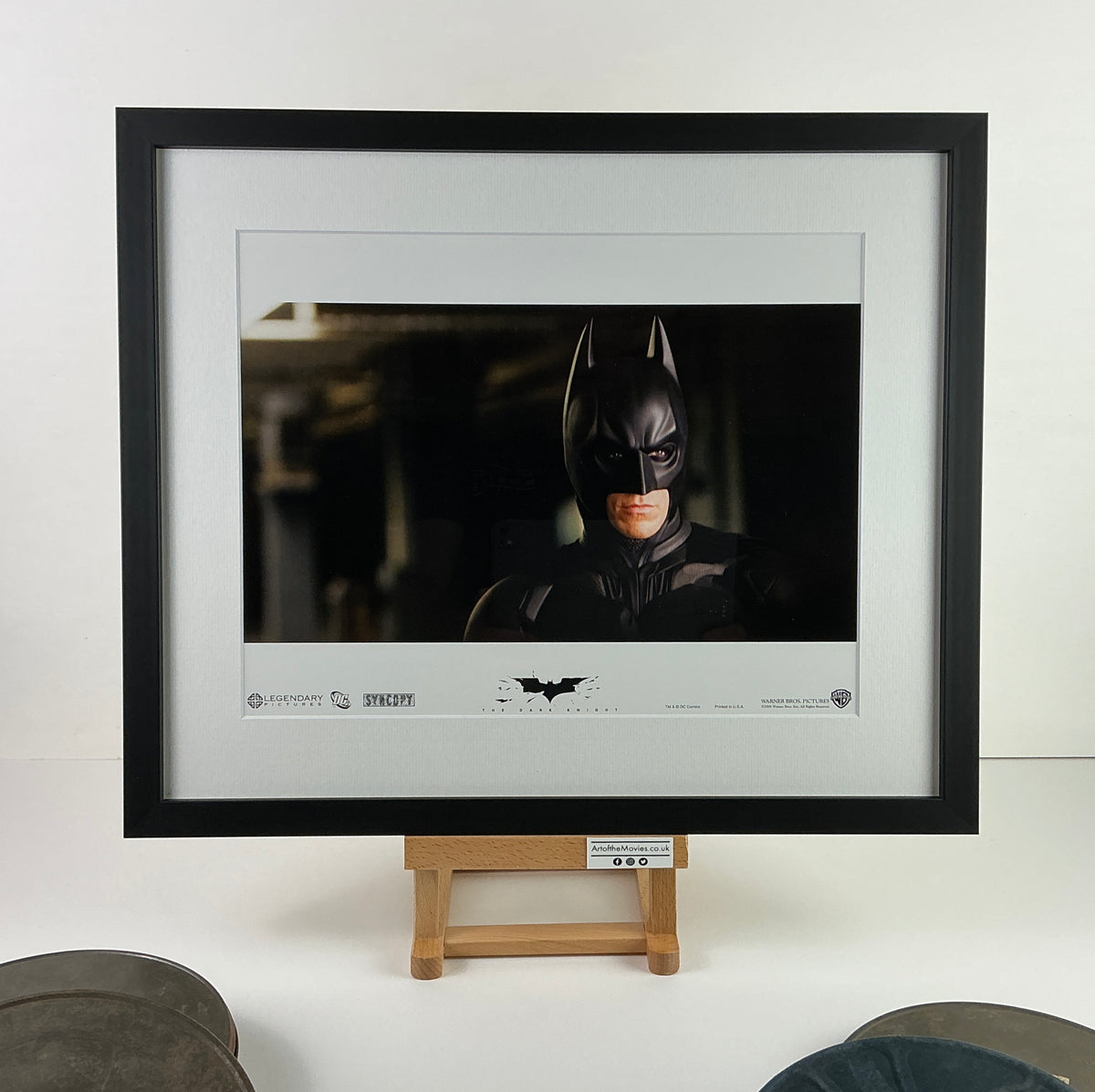 An original lobby card for the film The Dark Knight