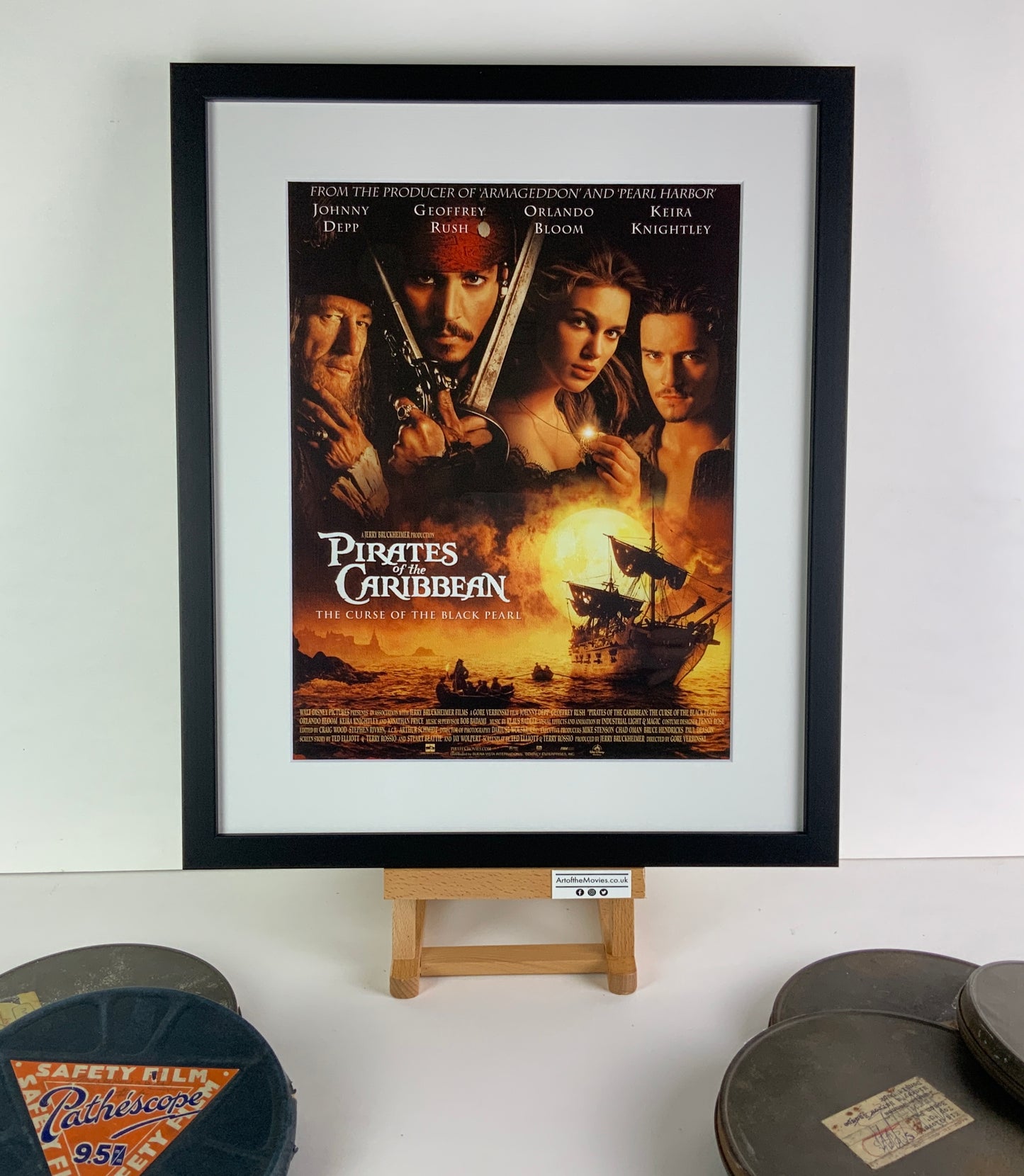 An original title lobby card for the film Pirates of the Caribbean: The Curse of the Black Pearl