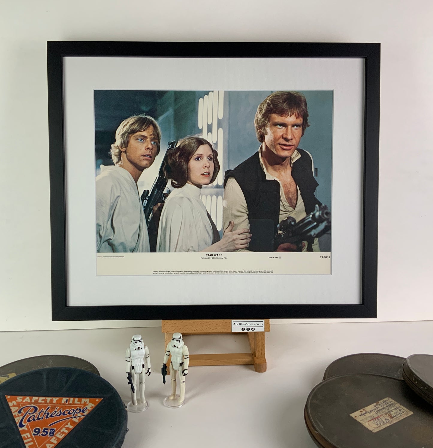 An original 11x14 lobby card for the George Lucas film Star Wars (1977)