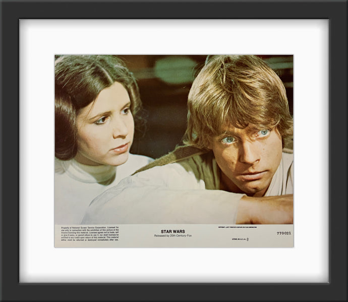 An original 8x10 lobby card for the George Lucas film Star Wars, A New Hope, Episode 4 / IV
