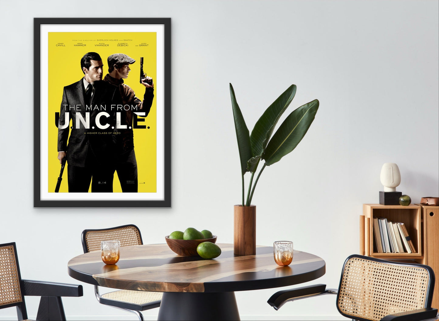 An original movie poster for the 2015 film The Man From UNCLE / U.N.C.L.E.