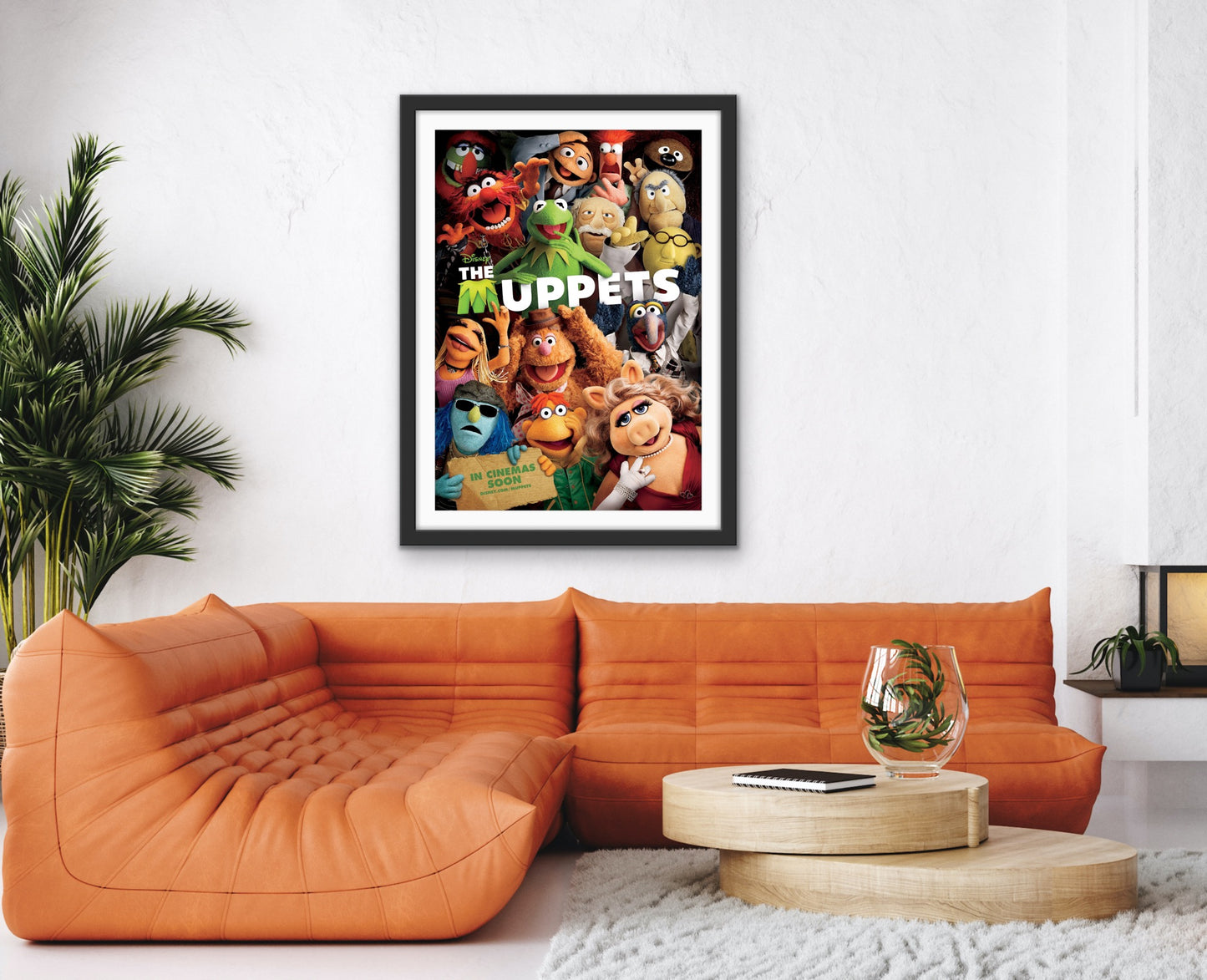 An original movie poster for the 2011 film The Muppets