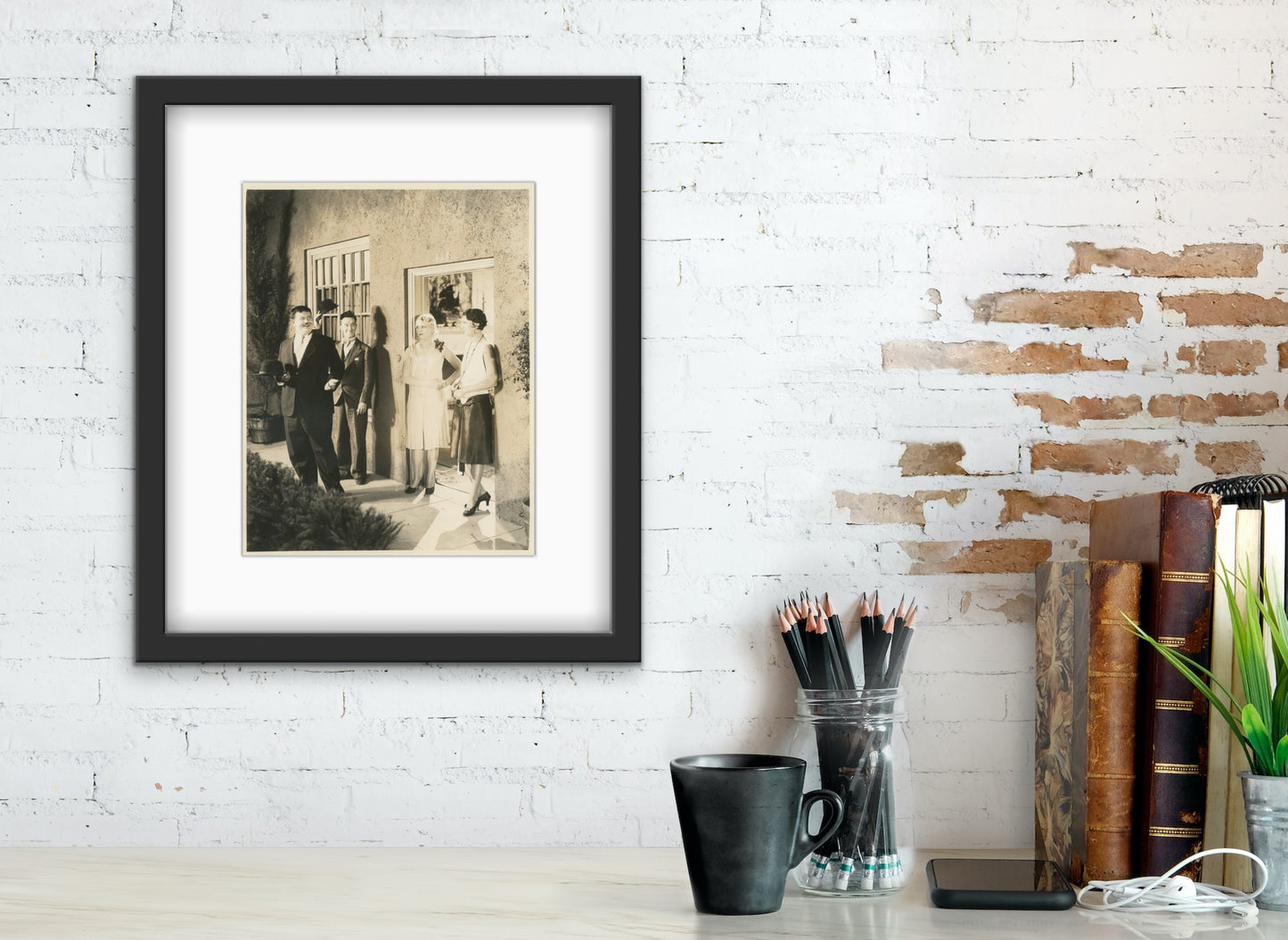 An original theatrical still from the Laurel and Hardy film We Faw Down