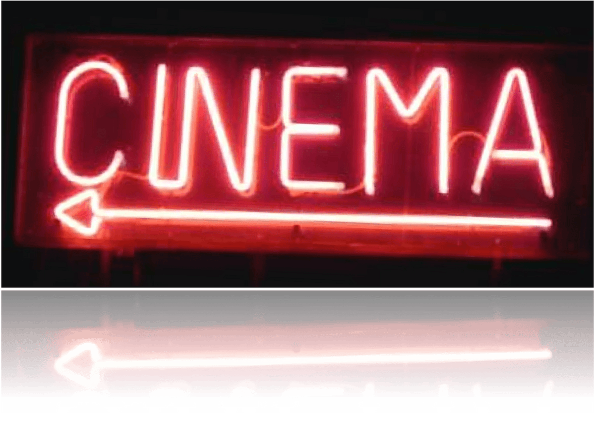 A neon cinema sign