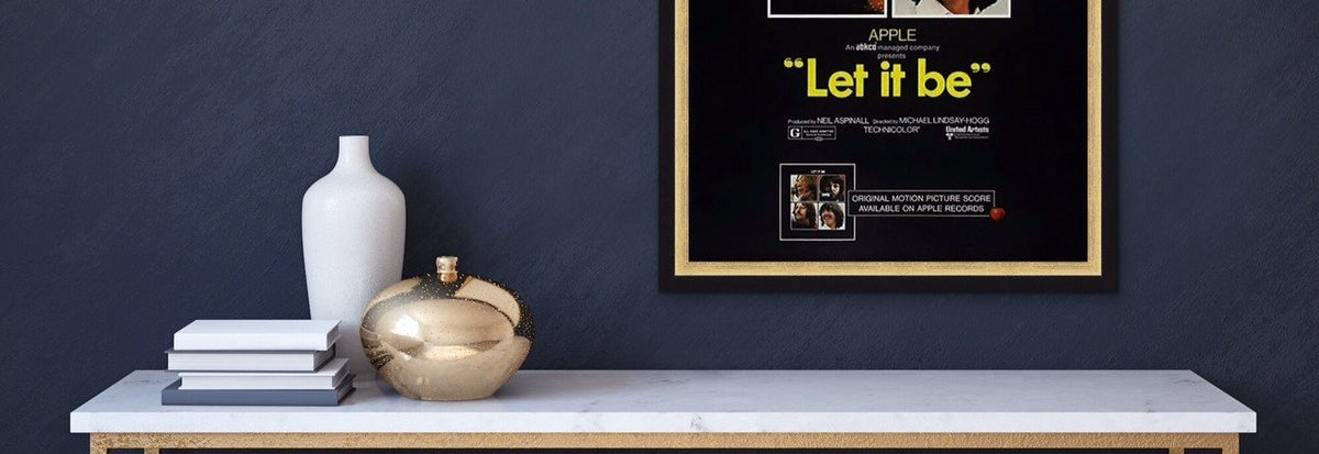 A close up of a movie poster for the Beatles' Let It Be