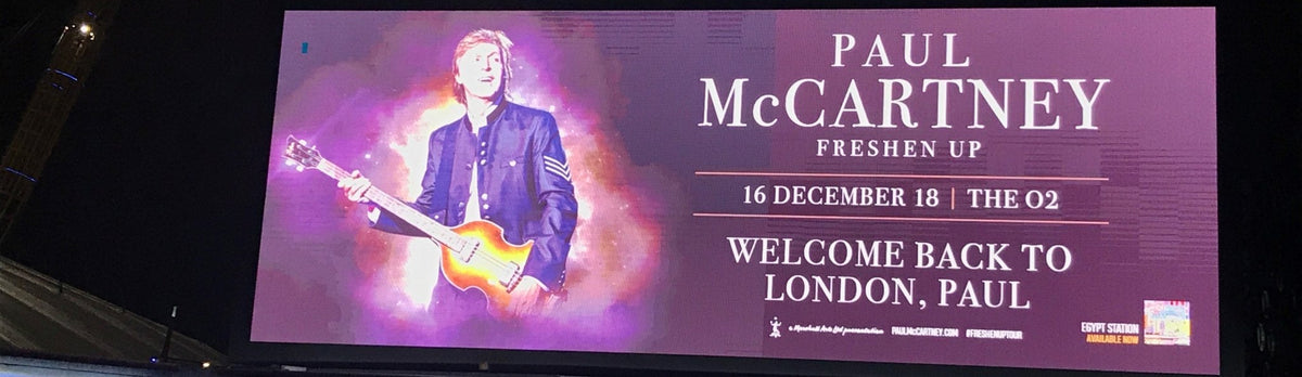 A billboard poster for Paul McCartney's December 2018 concert at the O2 London