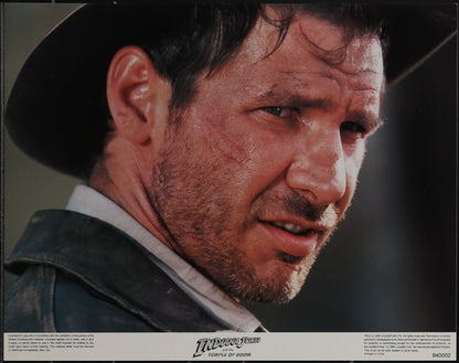 An original 11x14 lobby card / movie poster for the film Indiana Jones and the Temple of Doom