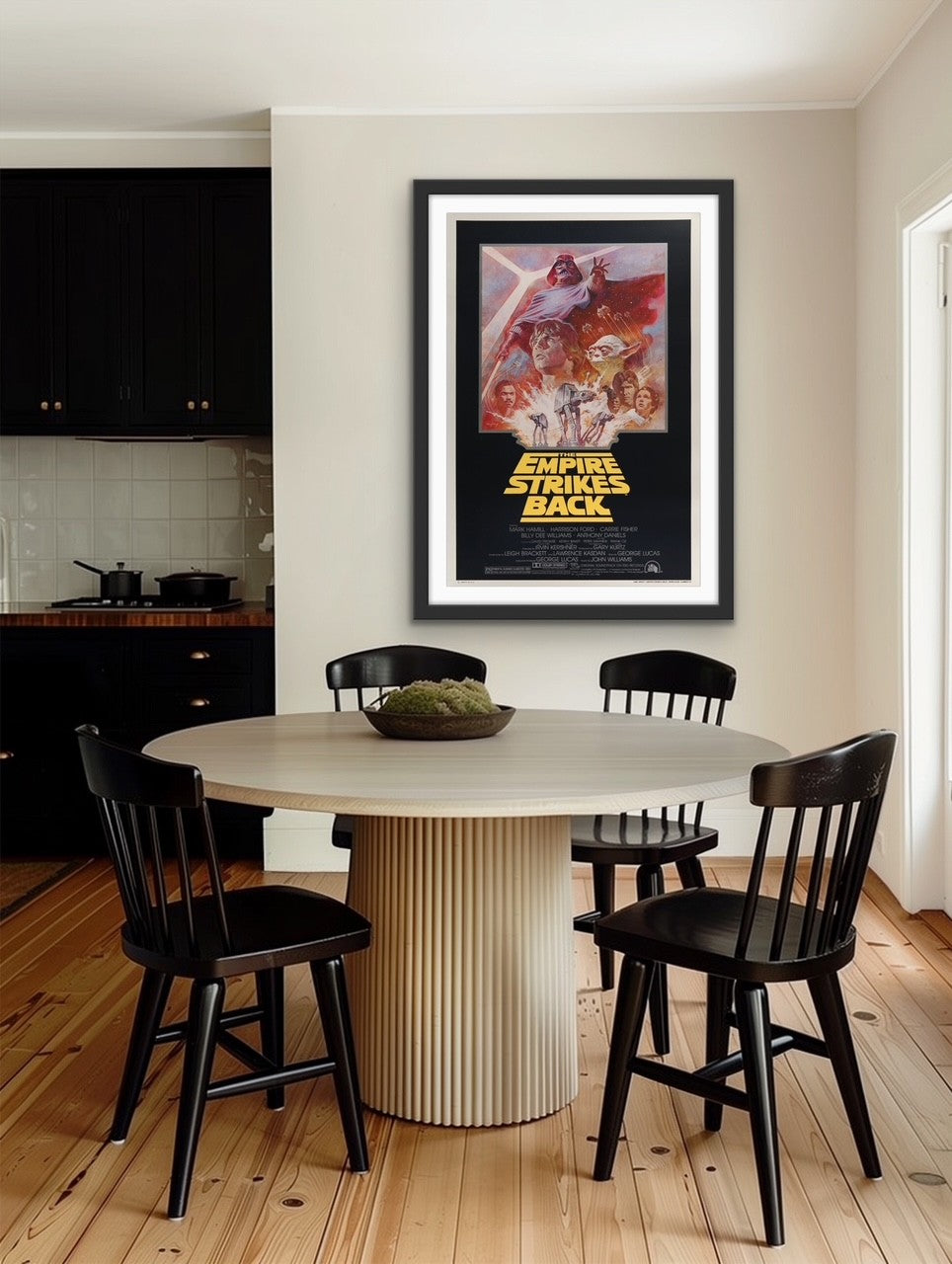 An original movie poster for the Star Wars film The Empire Strikes Back with artwork by Tom Jung
