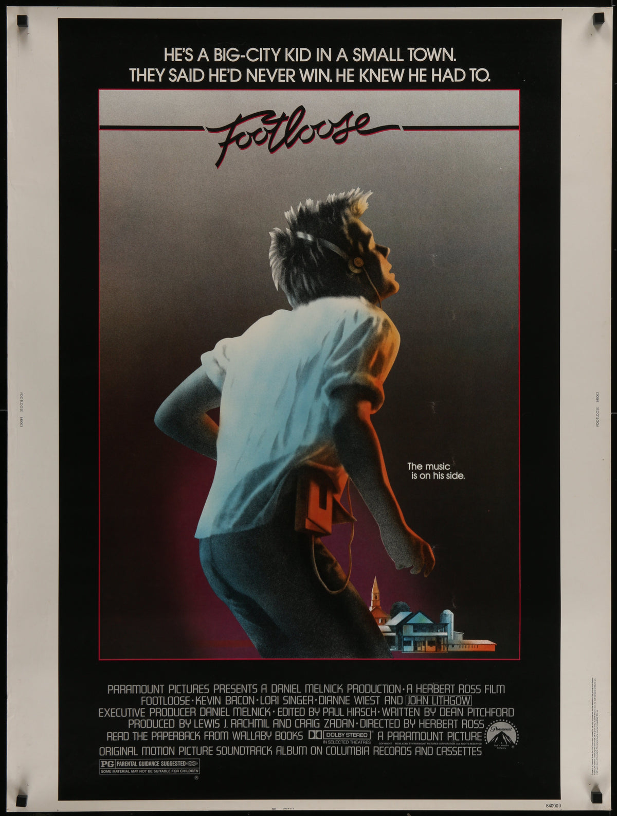 An original movie poster for the Kevin Bacon film Footloose