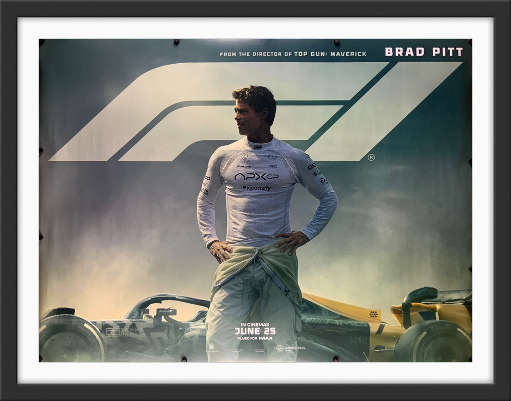 An original movie poster for the Brad Pitt film F1 The Movie