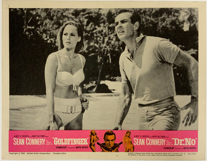 An original 11x14 lobby card for the James Bond double-bill Dr No and Goldfinger