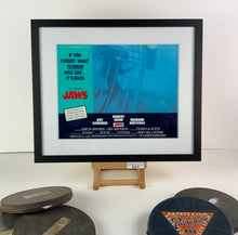 Load image into Gallery viewer, An original 11x14 lobby card for the Steven Spielberg film Jaws