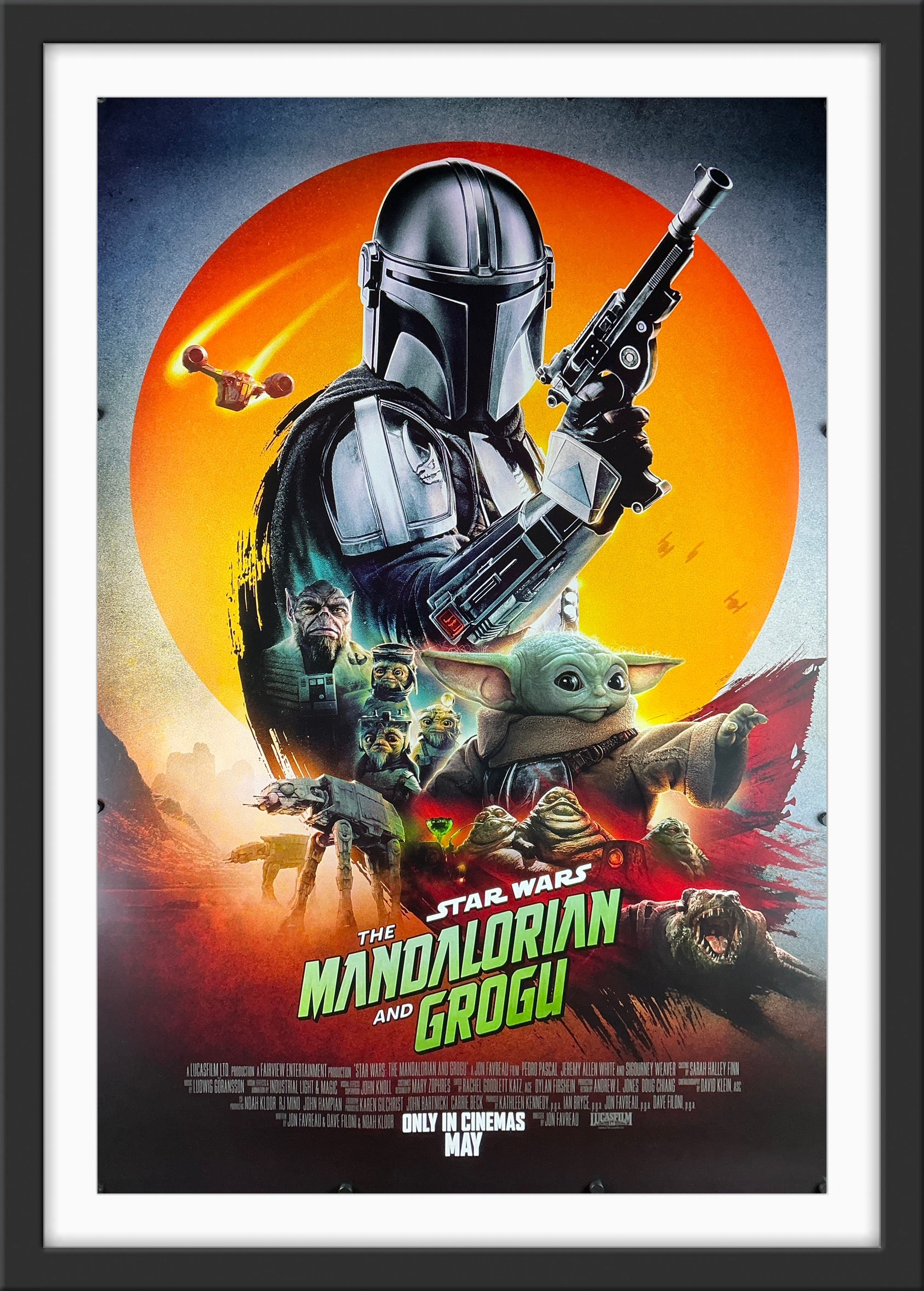 An original movie poster for the Star Wars film The Mandalorian and Grogu