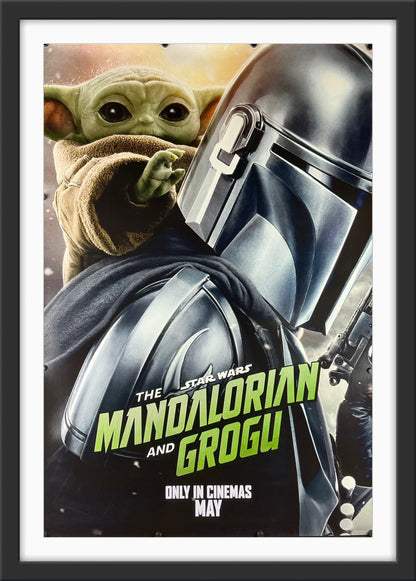 An original movie poster for the Star Wars film The Mandalorian and Grogu