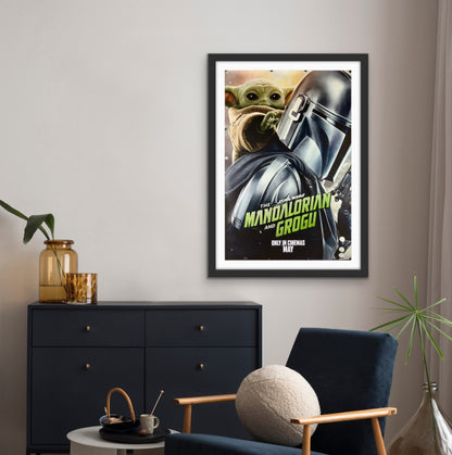 An original movie poster for the Star Wars film The Mandalorian and Grogu