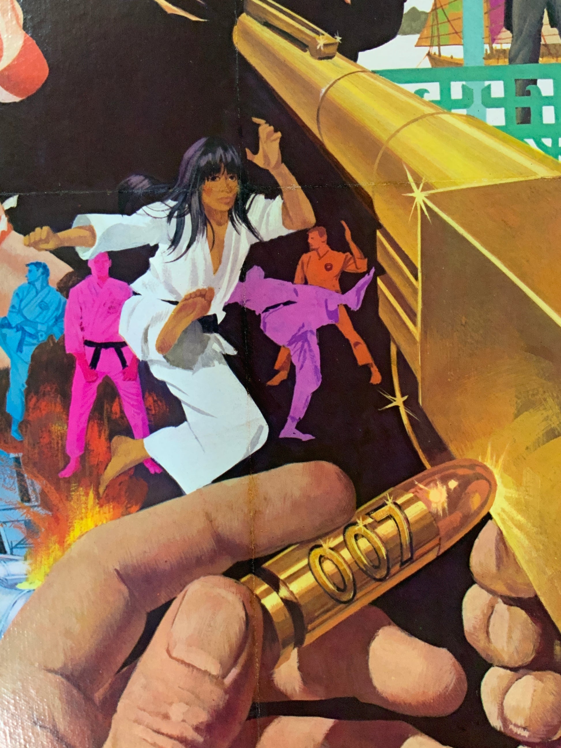 An original movie poster for the James Bond film The Man With The Golden Gun