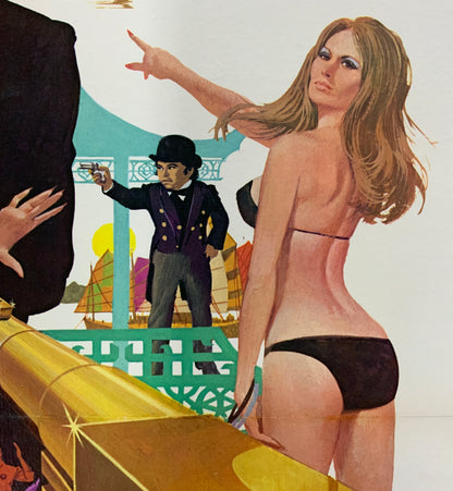 An original movie poster for the James Bond film The Man With The Golden Gun
