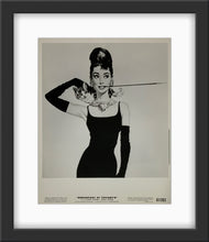 Load image into Gallery viewer, An original movie still for the film Breakfast At Tiffany&#39;s with artwork by Robert McGinnis