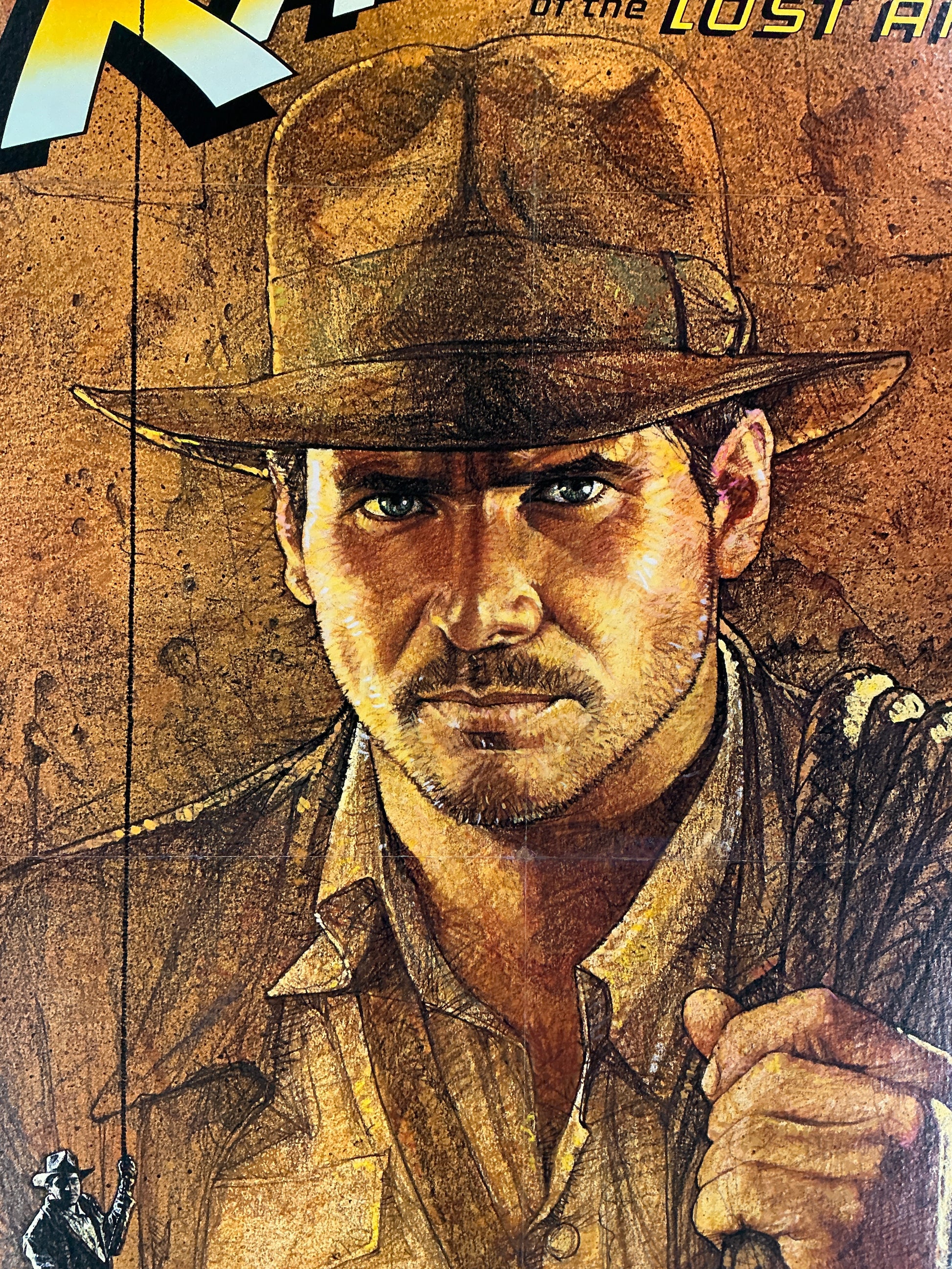 An original movie poster for the Indiana Jones film Raiders of the Lost Ark