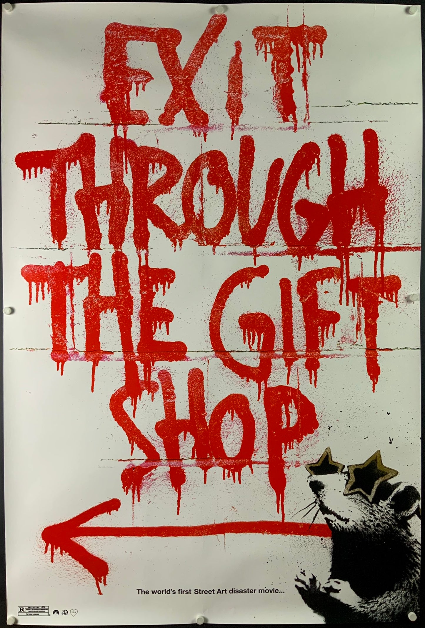 An original movie poster for the Banksy film Exit Through The Gift Shop