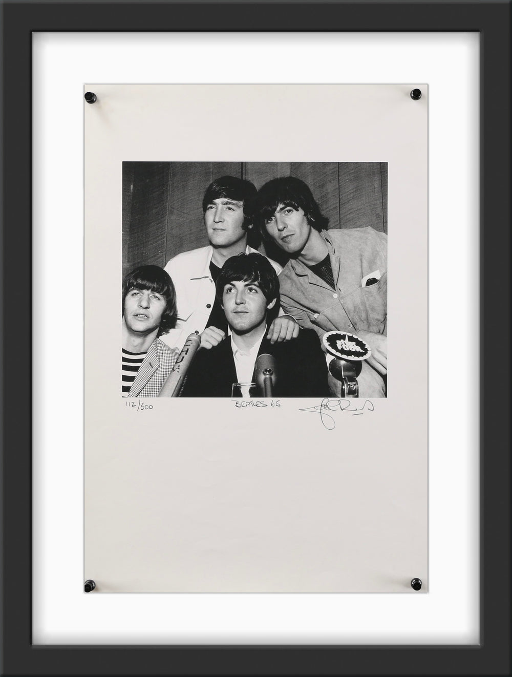 An art print byJohn Rowlands of The Beatles from Toronto 1965. Signed and numbered.
