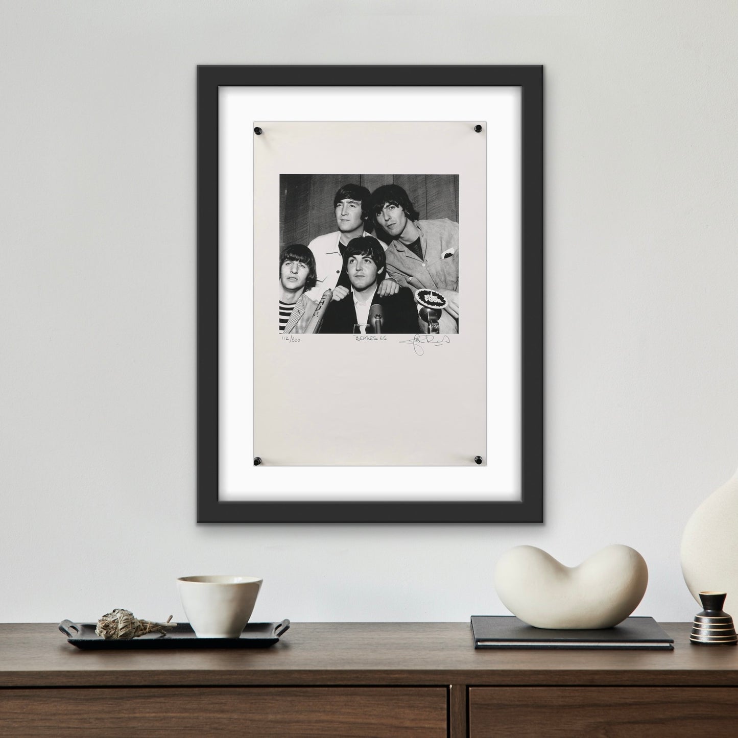 An art print byJohn Rowlands of The Beatles from Toronto 1965. Signed and numbered.