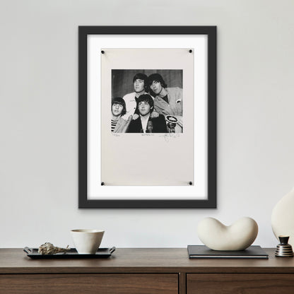 An art print byJohn Rowlands of The Beatles from Toronto 1965. Signed and numbered.