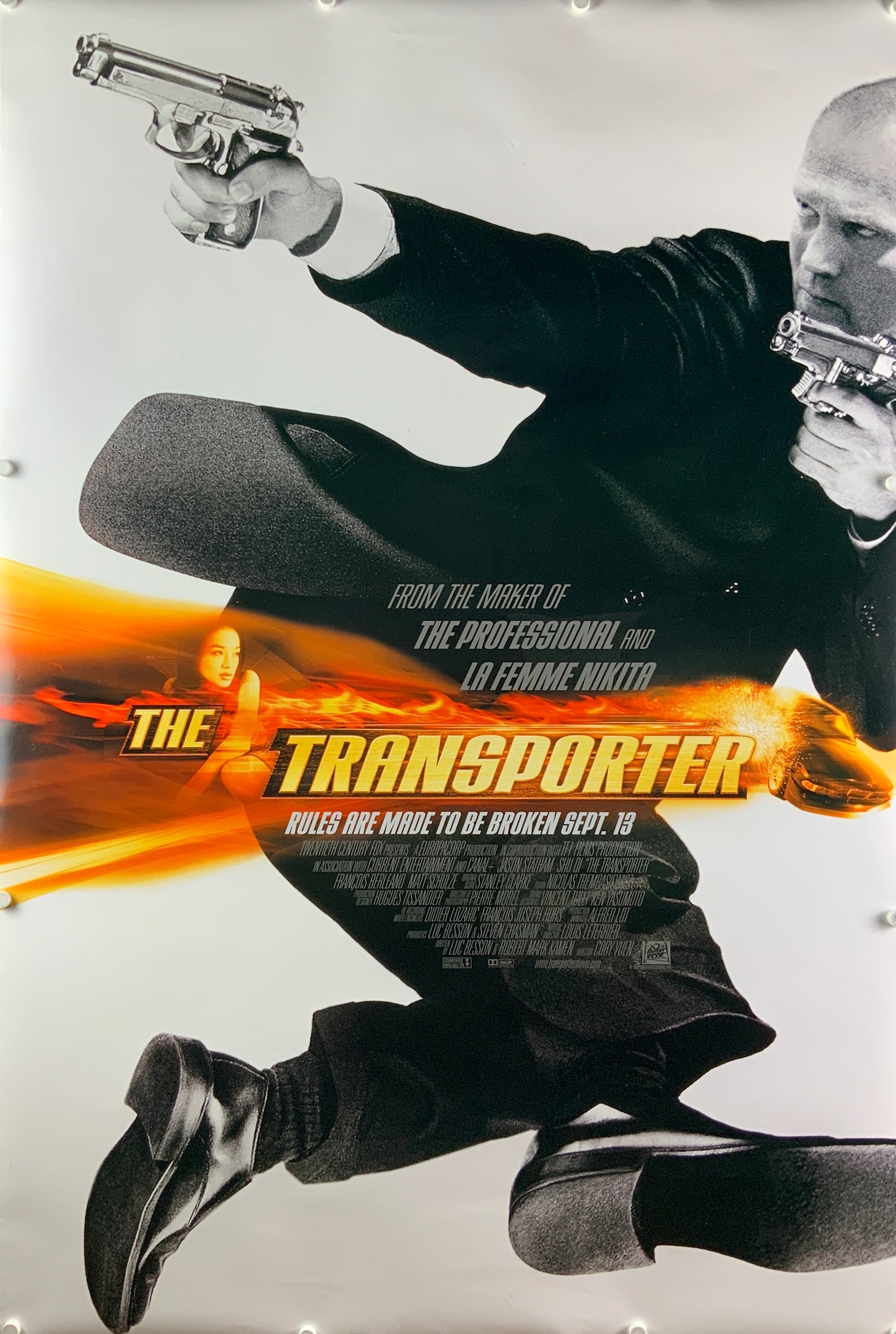 An original movie poster for the Jason Statham film The Transporter