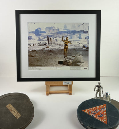 An original framed 11x14 lobby card for the Star Wars film The Empire Strikes Back