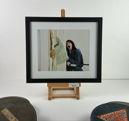 An original 8x10 lobby card for the Stanley Kubrick film The Shining