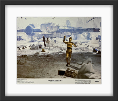 An original framed 11x14 lobby card for the Star Wars film The Empire Strikes Back