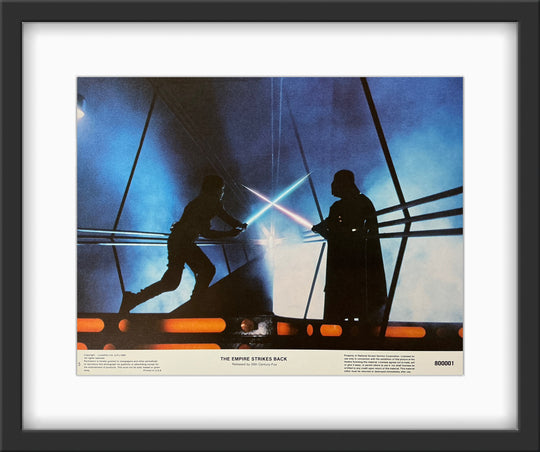 An original 11x14 lobby card for the Star Wars film The Empire Strikes Back
