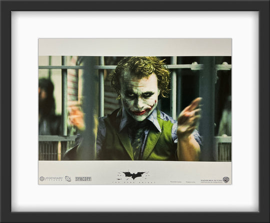 An original 11x14 lobby card for the Batman film The Dark Knight