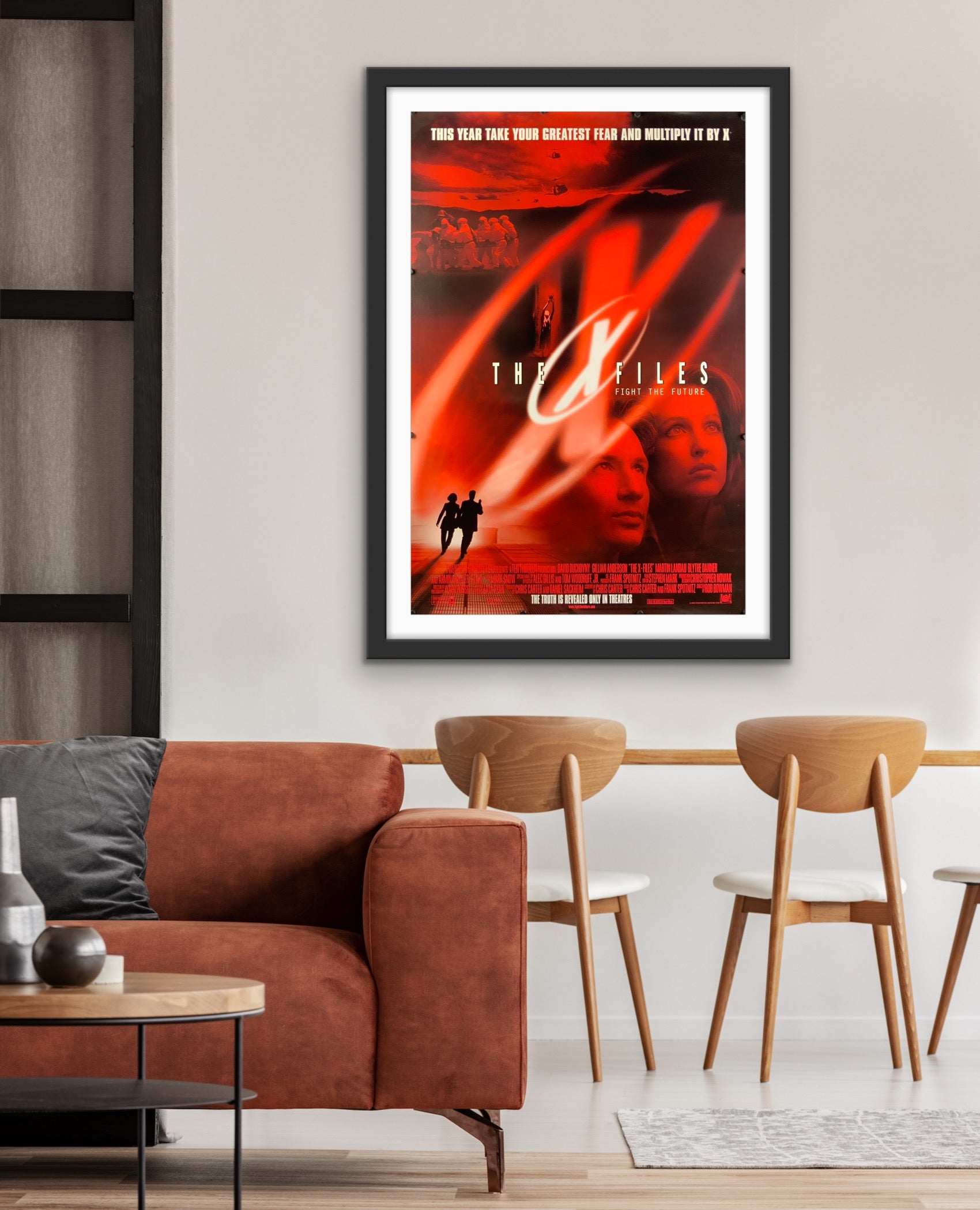 An original movie poster for the film The X Files Fight The Future