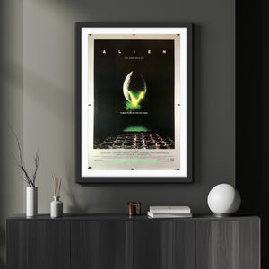 An original movie poster for the sci-fi horror film Alien