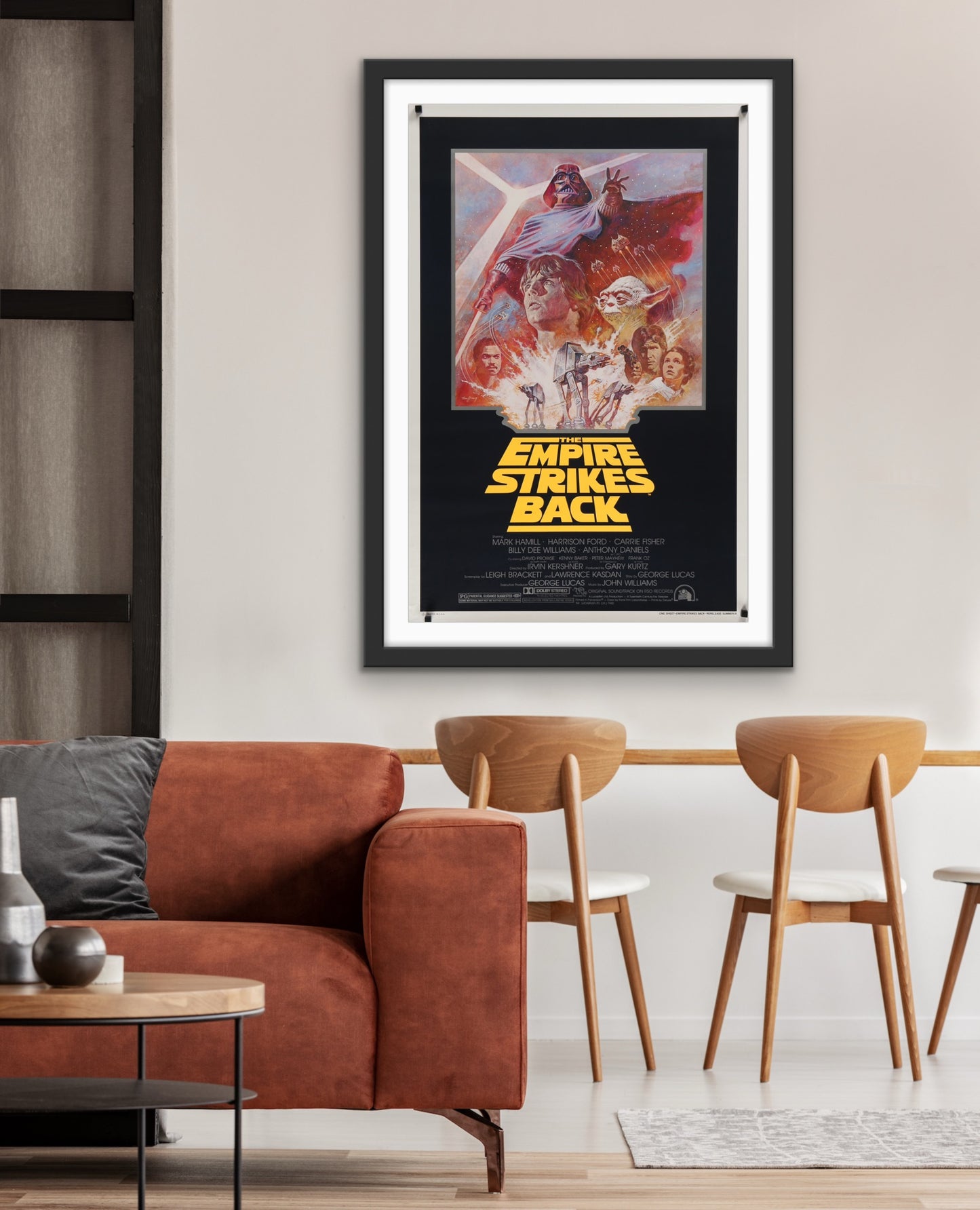 An original movie poster for the Star Wars film The Empire Strikes Back with artwork by Tom Jung