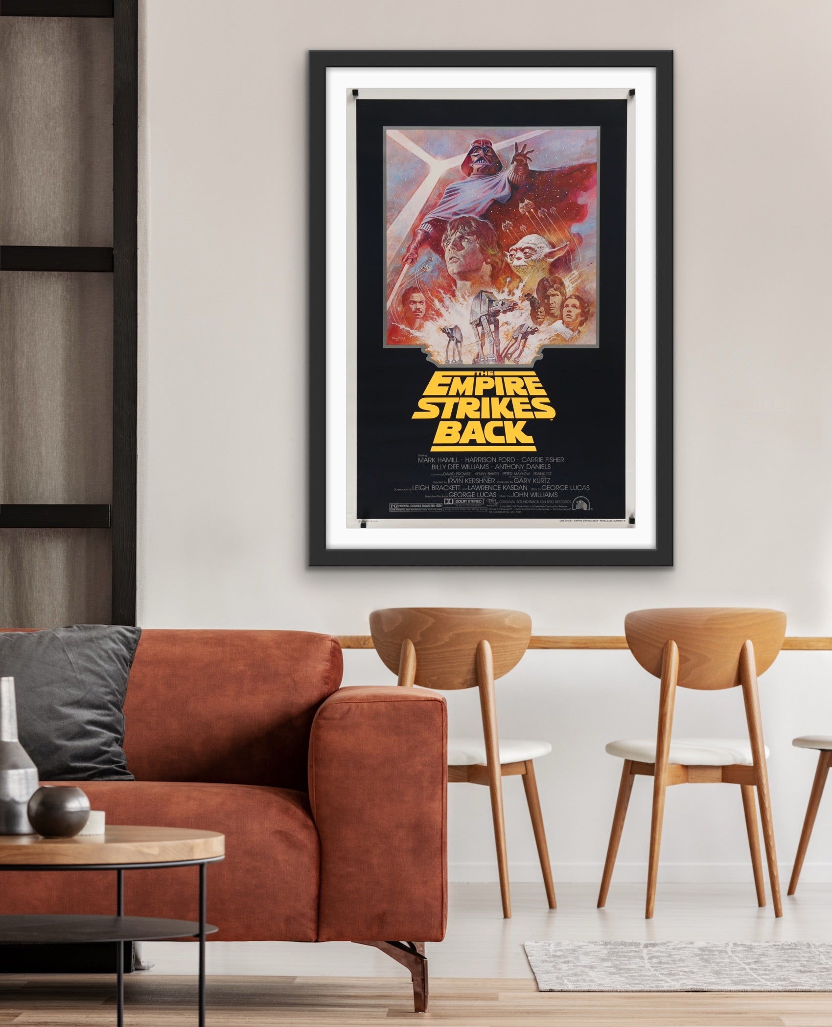 An original movie poster for the Star Wars film The Empire Strikes Back with artwork by Tom Jung