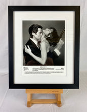 Load image into Gallery viewer, An original 8x10 movie still form the James Bond film Goldeneye