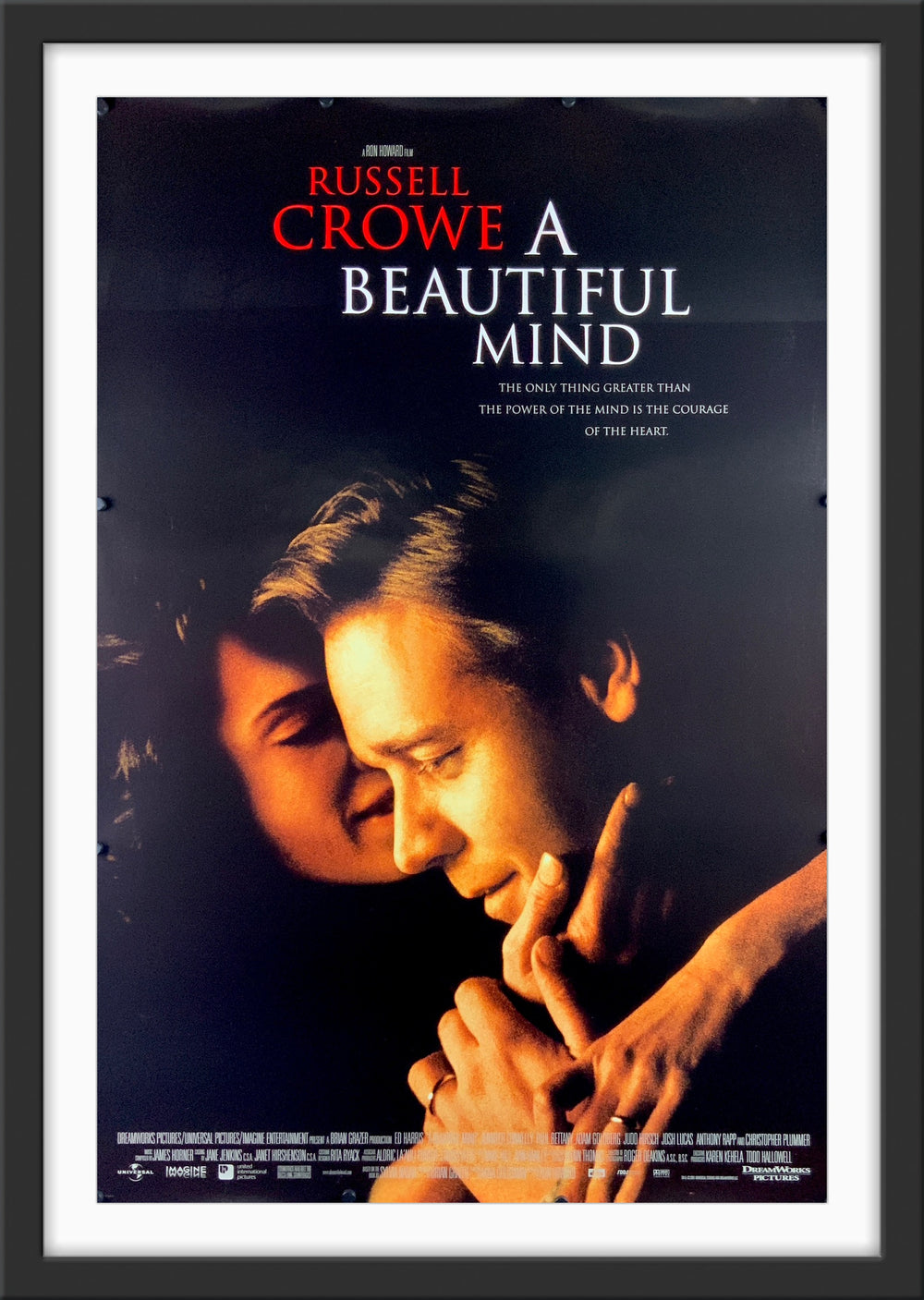 An original movie poster for the Russell Crowe film A Beautiful Mind