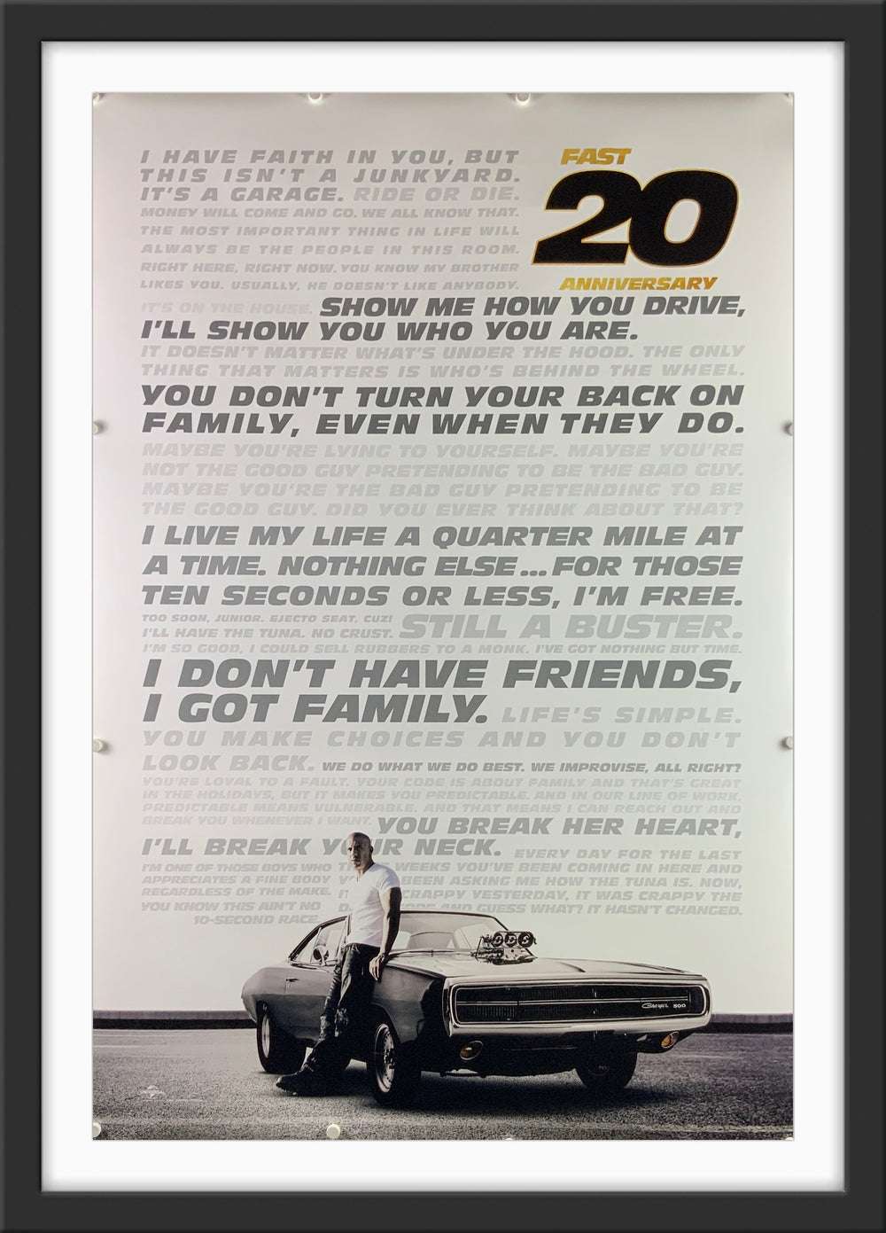 An original movie poster for the twentieth anniversary release of 2001's The Fast and the Furious