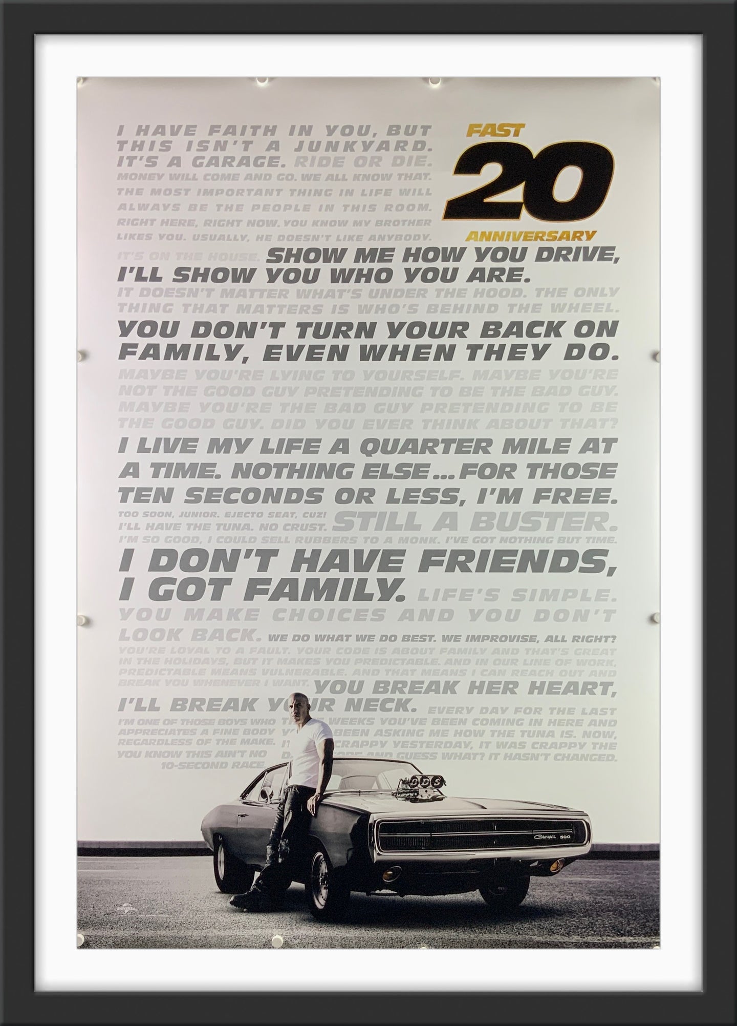 An original movie poster for the twentieth anniversary release of 2001's The Fast and the Furious