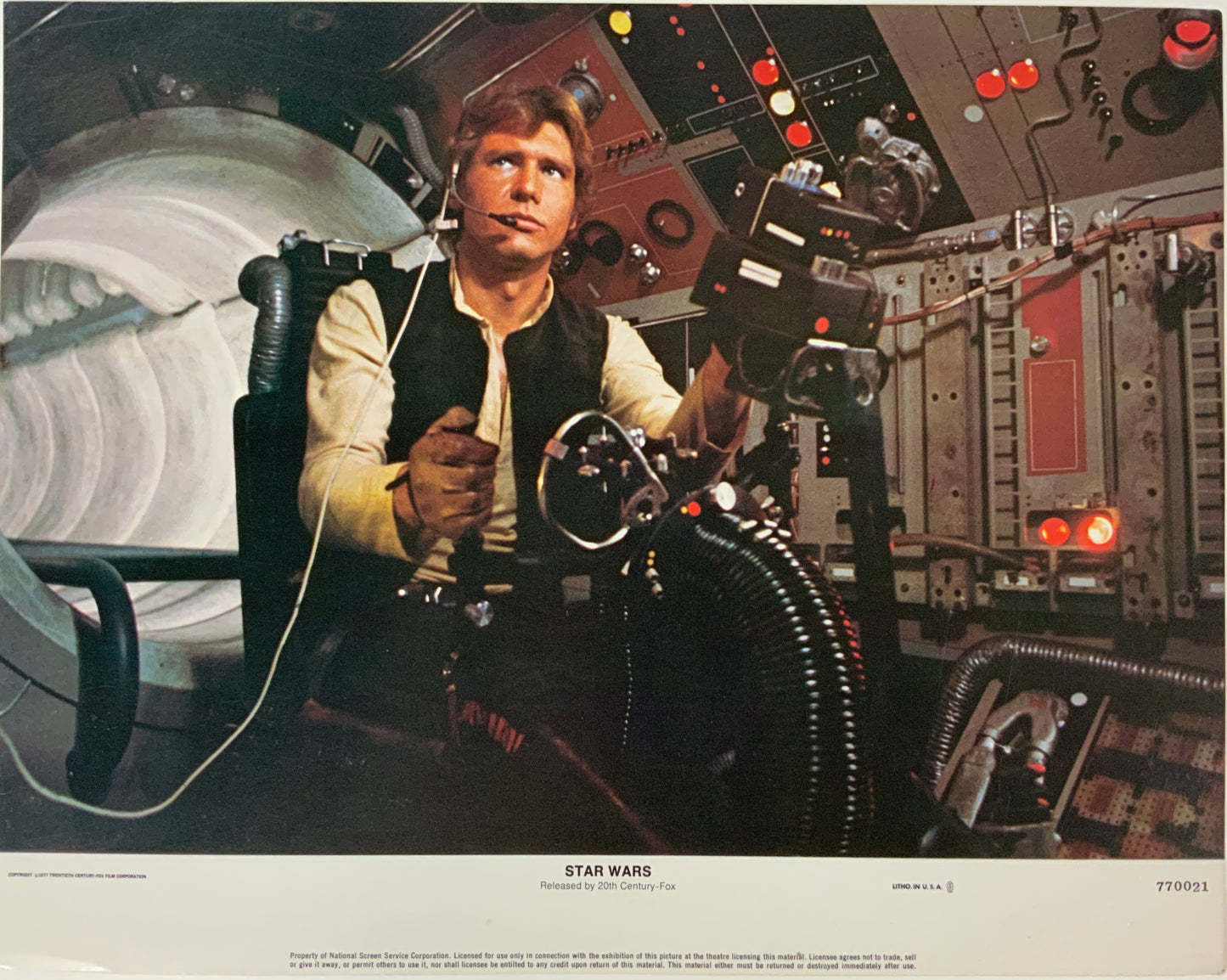 An original 11x14 lobby card for the George Lucas film Star Wars (1977)