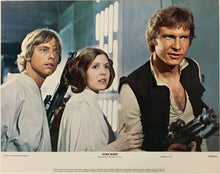 Load image into Gallery viewer, An original 11x14 lobby card for the George Lucas film Star Wars (1977)