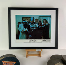 Load image into Gallery viewer, An original and framed 11x14 lobby card for the film Robocop