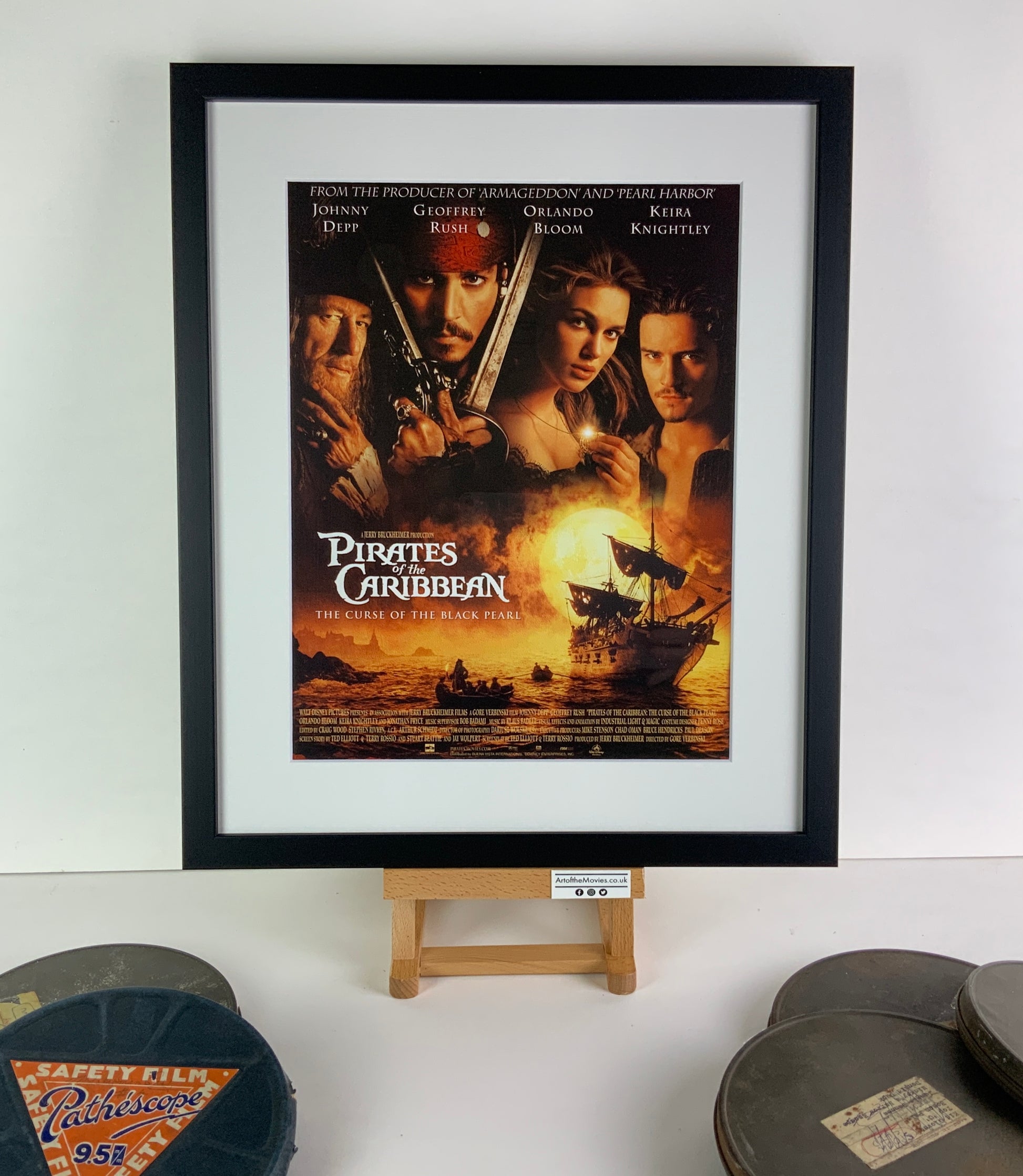An original title lobby card for the film Pirates of the Caribbean: The Curse of the Black Pearl