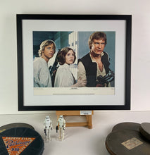 Load image into Gallery viewer, An original 11x14 lobby card for the George Lucas film Star Wars (1977)