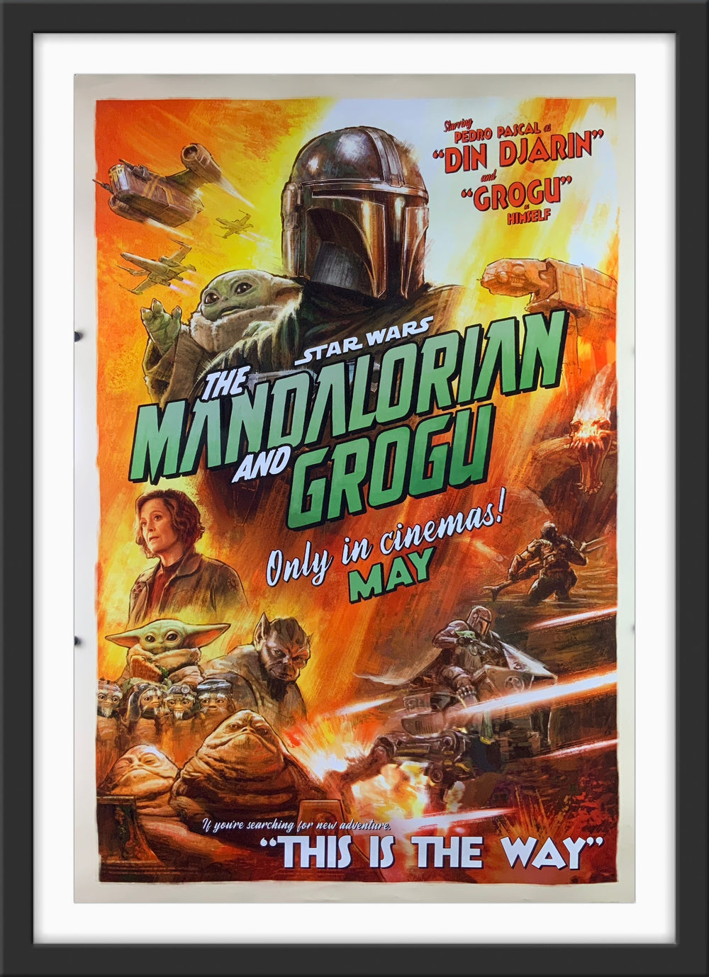 An original movie poster for the film The Mandalorian and Grogu