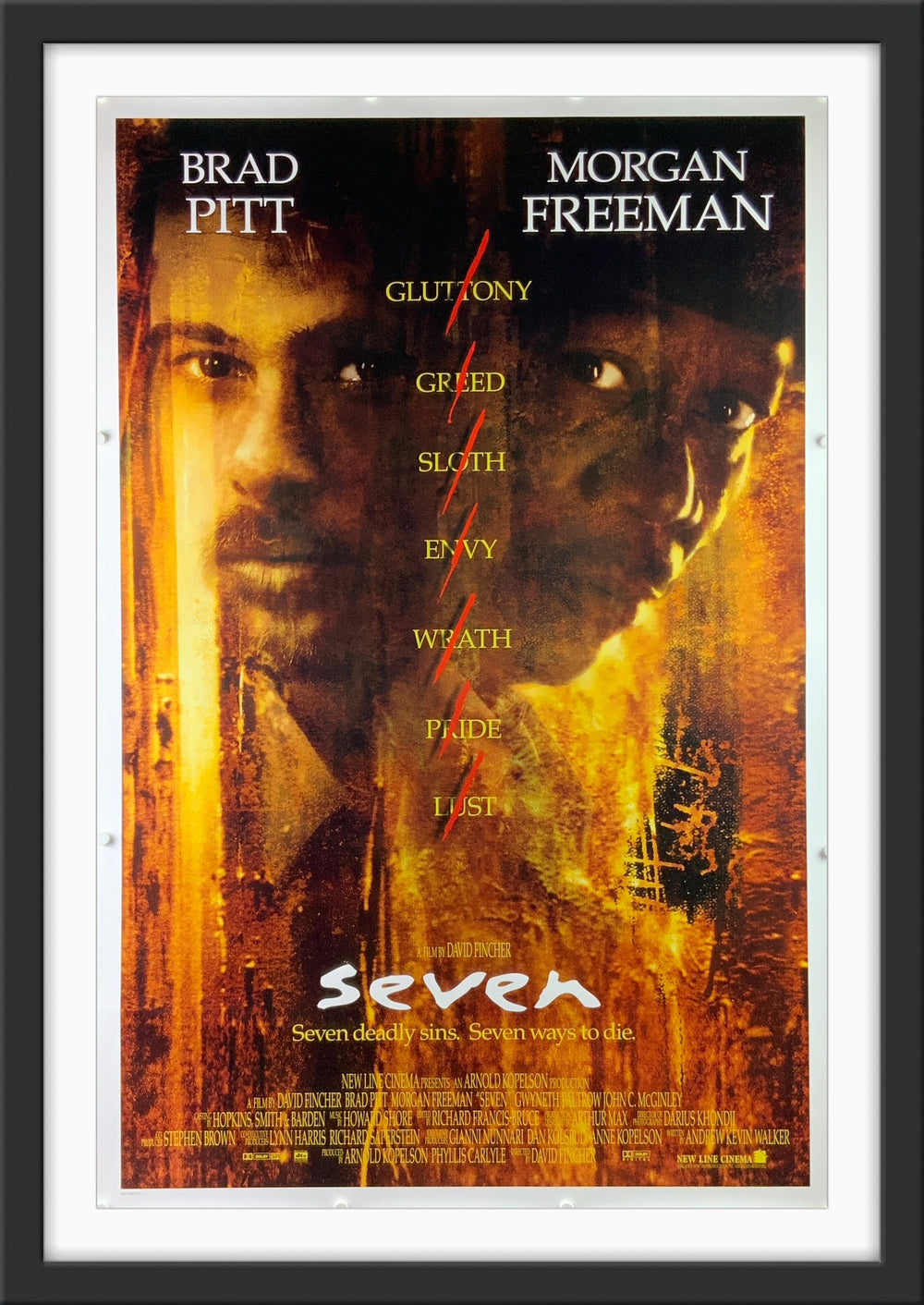An original movie poster for the Brad Pitt and Morgan Freeman film Seven