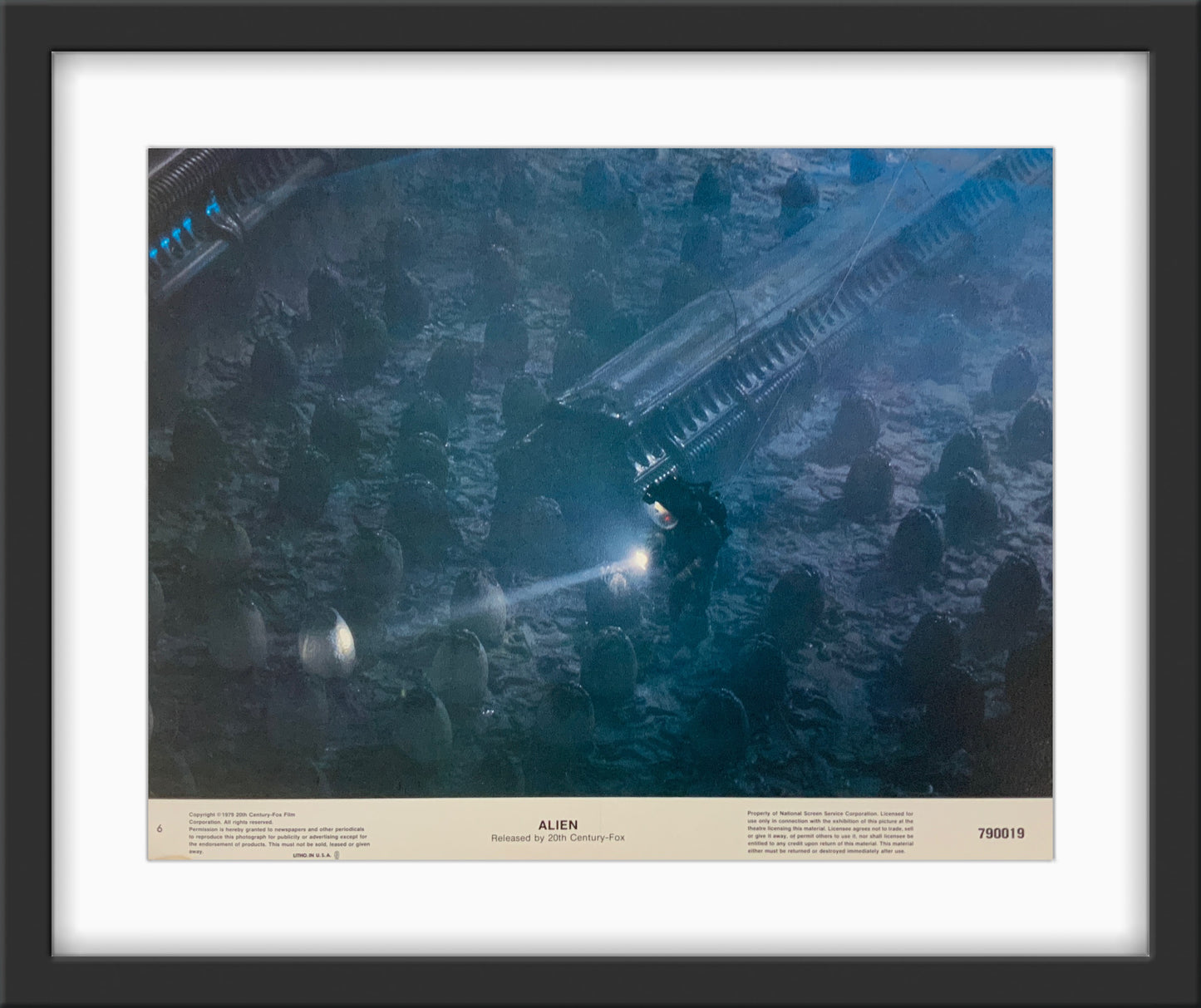 An original 11x14 lobby card for the Ridley Scott film Alien