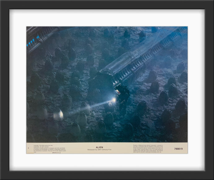 An original 11x14 lobby card for the Ridley Scott film Alien